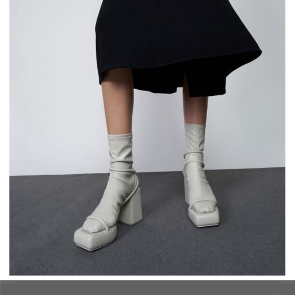 NIB *sold out* charles Keith leather sock/platforms in white